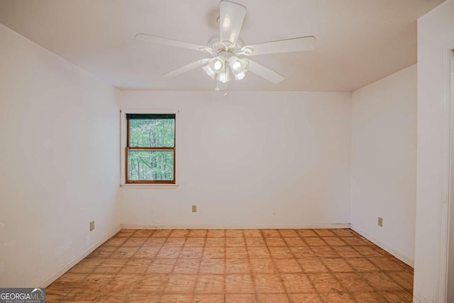 spare room with ceiling fan