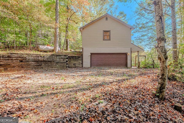 view of property exterior featuring a garage