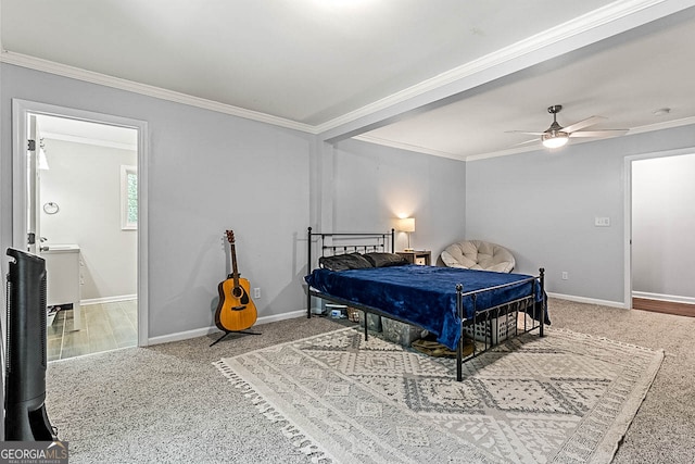 bedroom with crown molding, ceiling fan, and carpet flooring