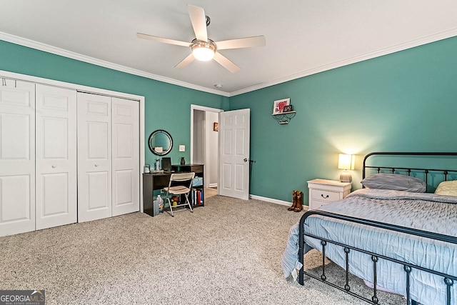 carpeted bedroom featuring crown molding, ceiling fan, and a closet