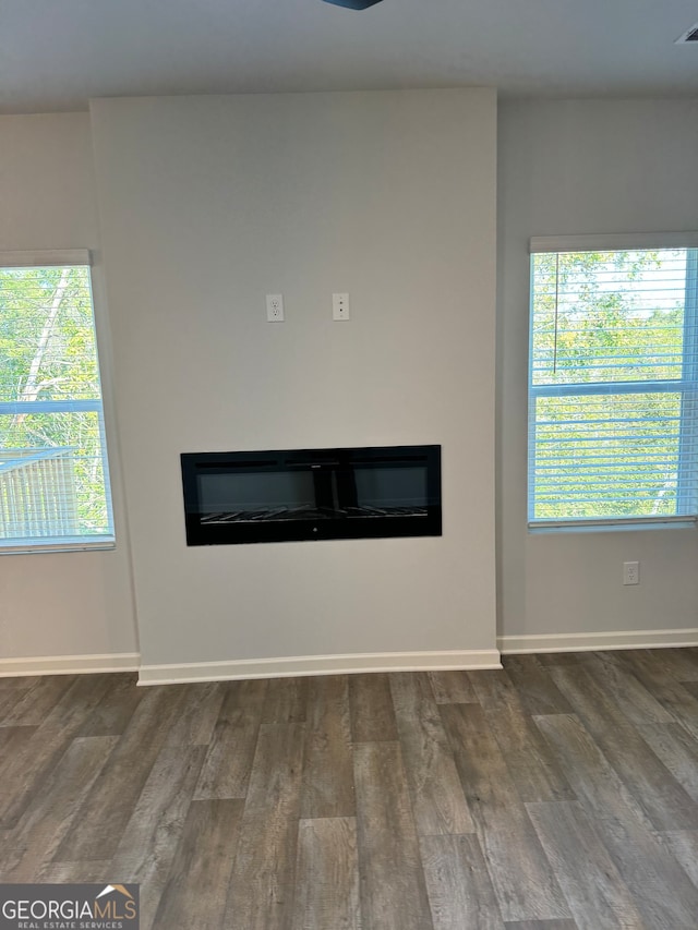 empty room featuring dark hardwood / wood-style floors