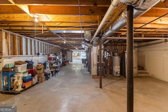 basement with water heater and heating unit