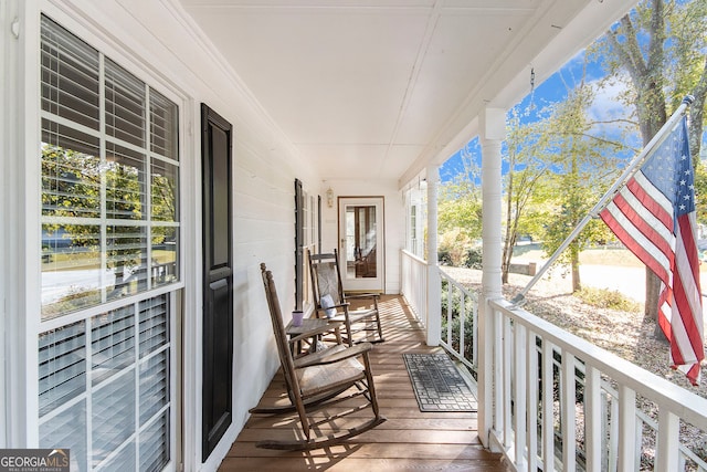 balcony featuring covered porch