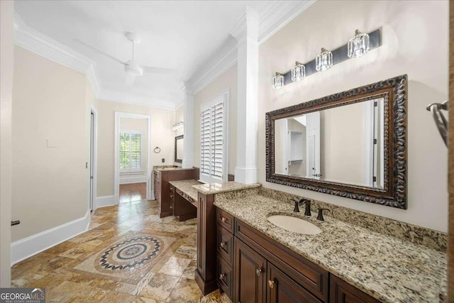 bathroom with vanity and crown molding