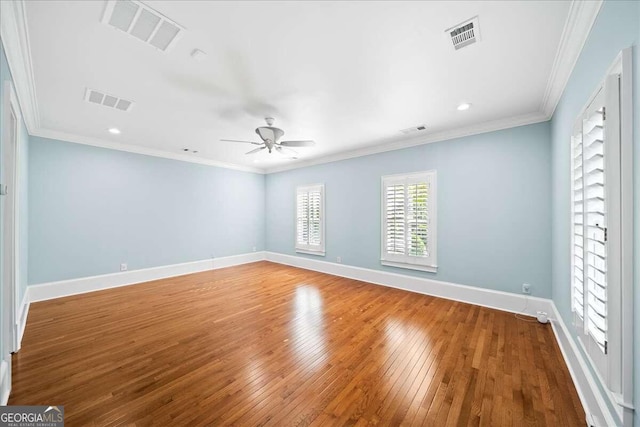 unfurnished room featuring crown molding, ceiling fan, and wood-type flooring