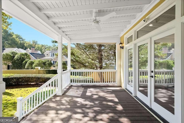 wooden terrace with french doors and ceiling fan