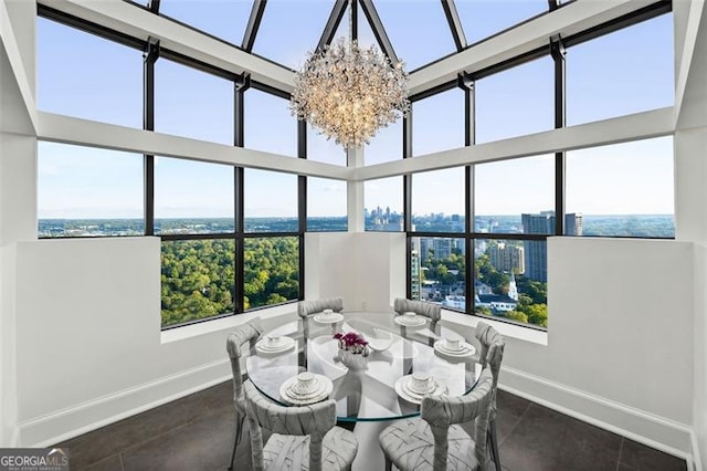 tiled dining room with a healthy amount of sunlight