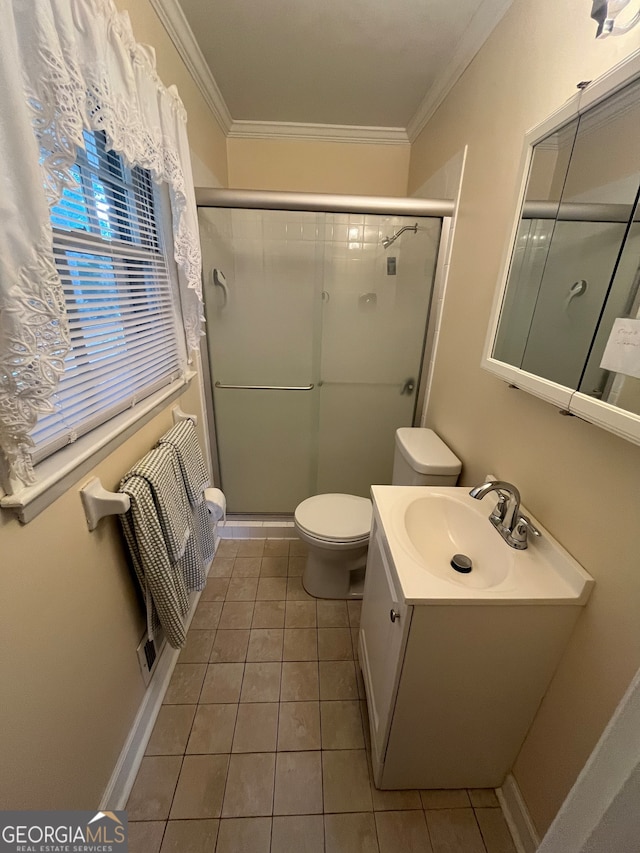 bathroom featuring walk in shower, crown molding, vanity, and toilet