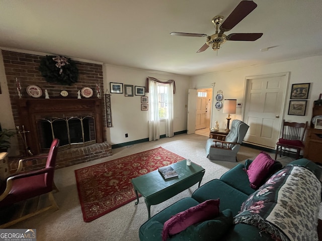 carpeted living room with ceiling fan and a fireplace