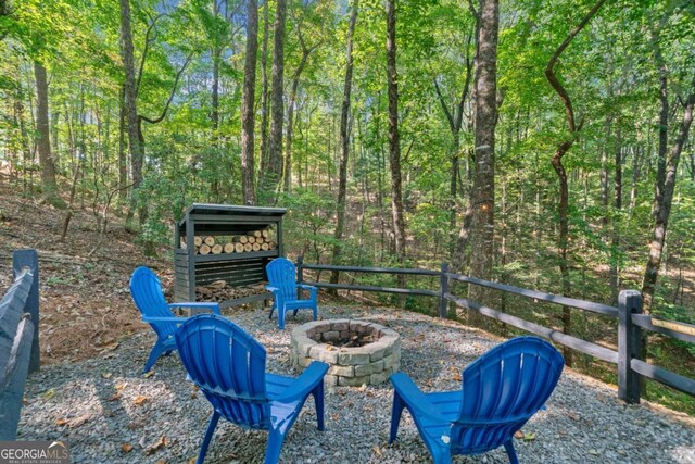 view of patio / terrace featuring a fire pit