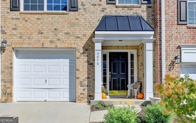 property entrance featuring a garage