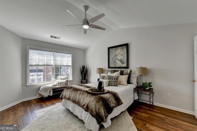 bedroom featuring lofted ceiling, ceiling fan, and dark hardwood / wood-style floors