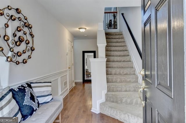 entrance foyer with hardwood / wood-style floors