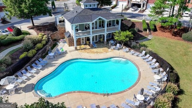 view of pool featuring a patio area