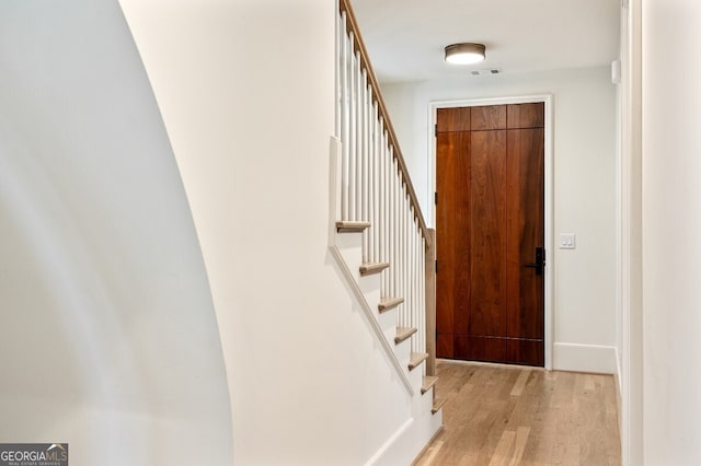 entryway with light hardwood / wood-style flooring