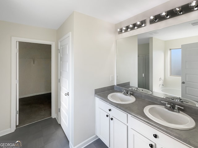 bathroom featuring a bathtub and vanity