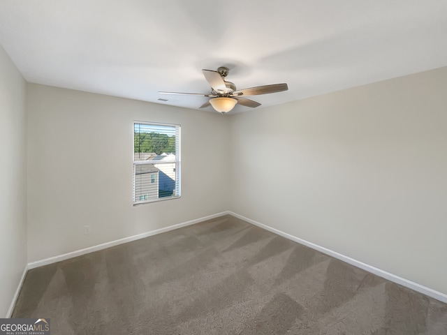 unfurnished room featuring carpet floors and ceiling fan