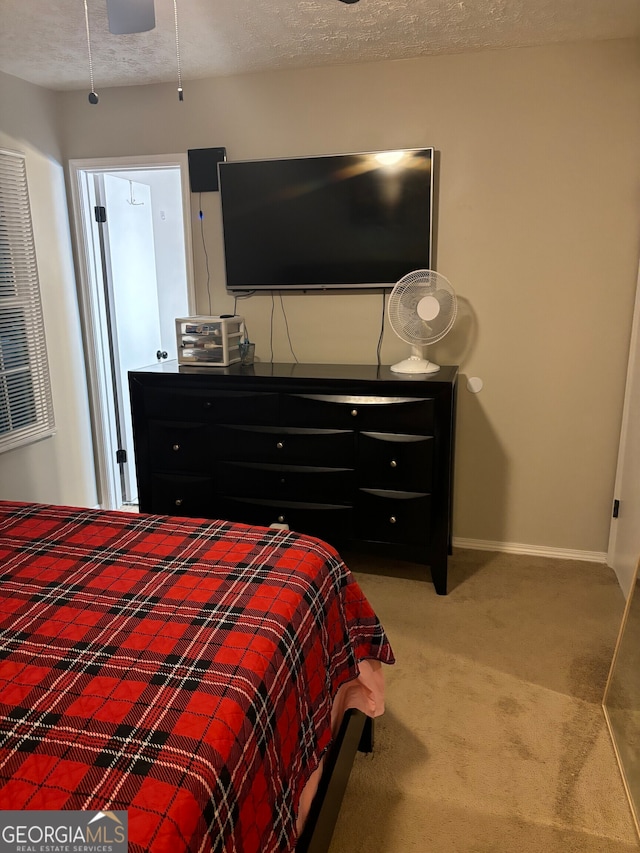 1126 Mainstreet Valley Dr, Stone Mountain, GA 30088 - bedroom with a textured ceiling and carpet floors