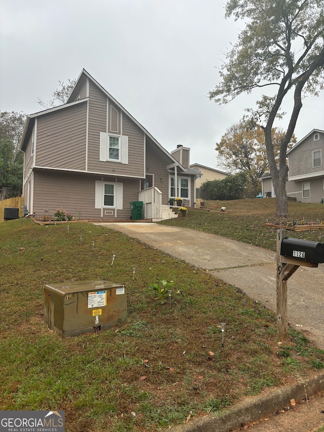 exterior space featuring a front yard