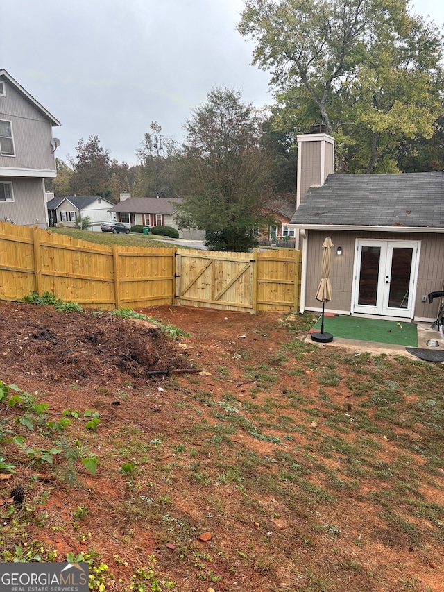 1126 Mainstreet Valley Dr, Stone Mountain, GA 30088 - view of yard featuring french doors