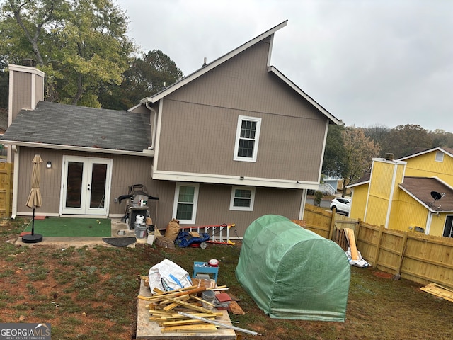 1126 Mainstreet Valley Dr, Stone Mountain, GA 30088 - rear view of house featuring french doors and a patio area