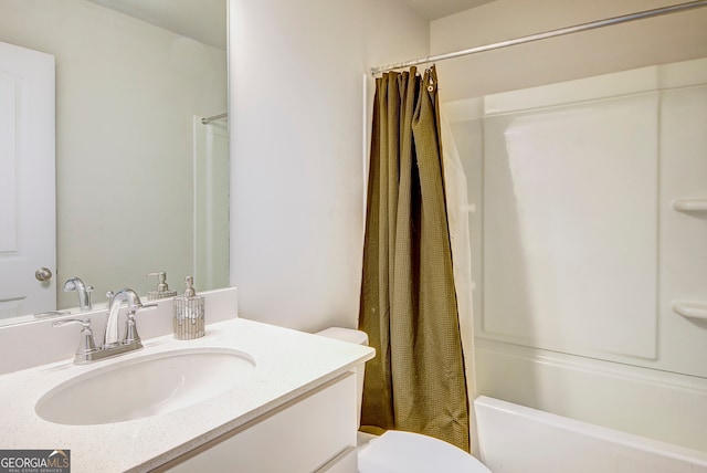 full bathroom featuring vanity, toilet, and shower / tub combo with curtain