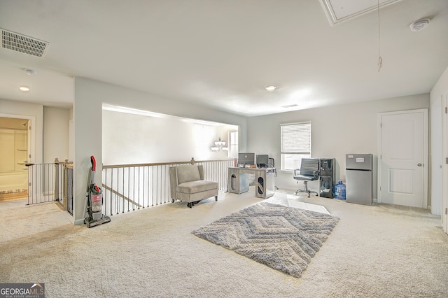 sitting room with light colored carpet