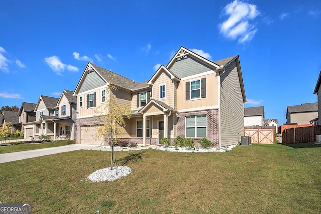 craftsman inspired home with a front yard, a garage, and central air condition unit