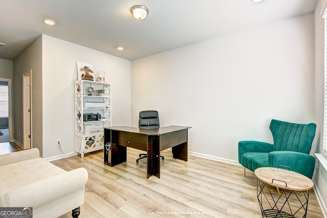 home office featuring light hardwood / wood-style floors