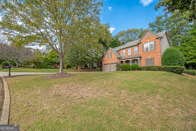 view of front of home with a front lawn