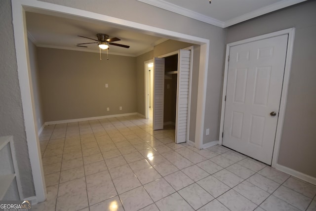 interior space with ceiling fan, light tile patterned floors, and ornamental molding