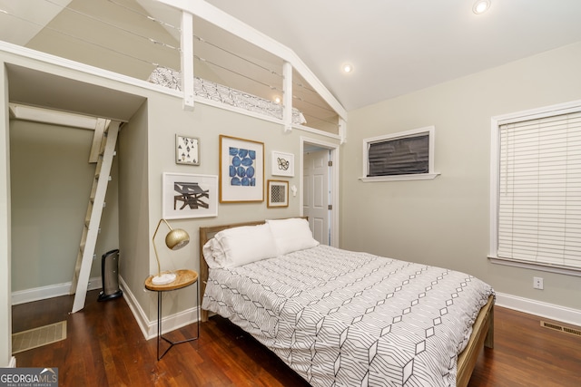 bedroom featuring vaulted ceiling and dark hardwood / wood-style flooring