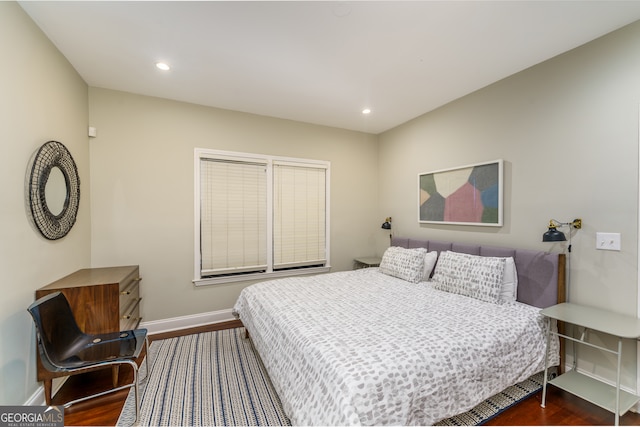 bedroom featuring dark wood-type flooring