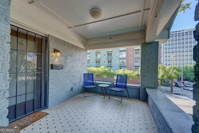 view of patio with a balcony