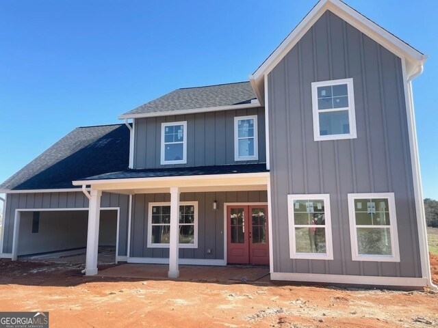 view of front property featuring a front yard and a porch