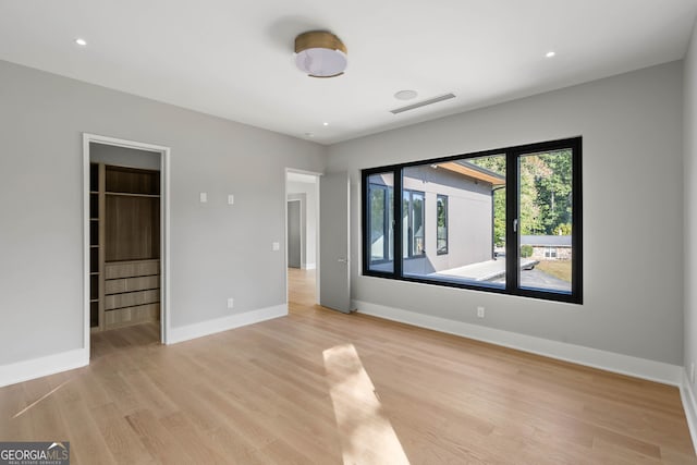 empty room with light wood-type flooring