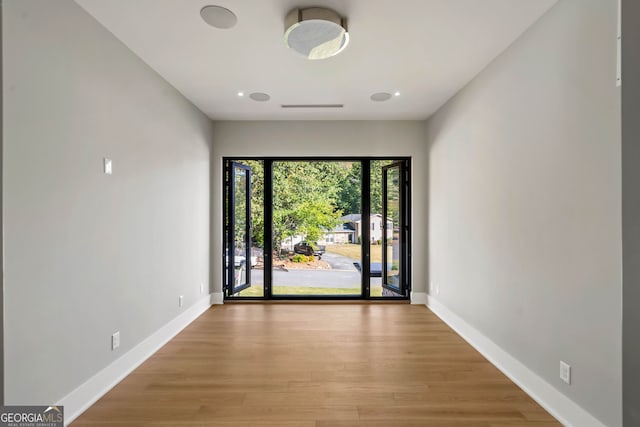 foyer with light hardwood / wood-style flooring