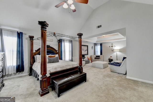 bedroom featuring carpet flooring, ceiling fan, and vaulted ceiling