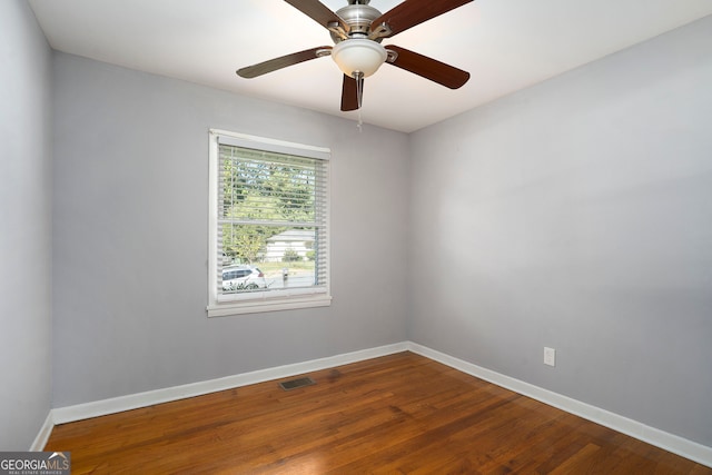 unfurnished room featuring hardwood / wood-style flooring and ceiling fan