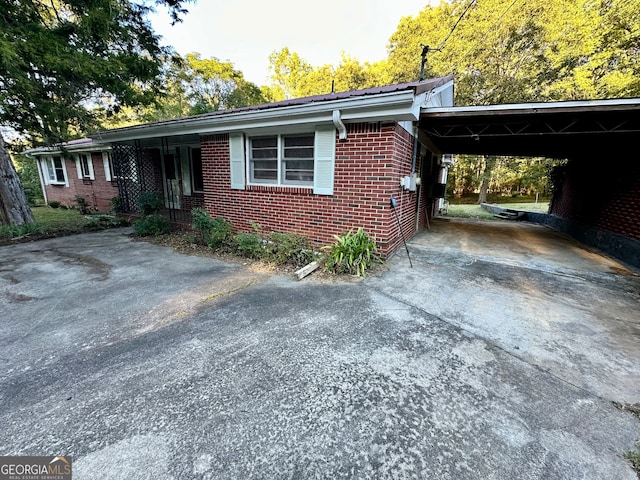 view of front of house featuring a carport