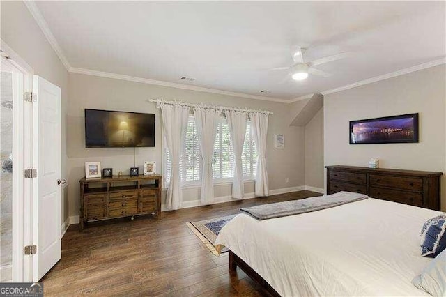 bedroom featuring ceiling fan, ornamental molding, and dark wood-type flooring