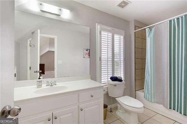 full bathroom with tile patterned flooring, vanity, toilet, and shower / tub combo