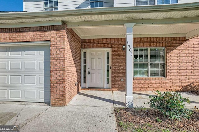 property entrance featuring a garage