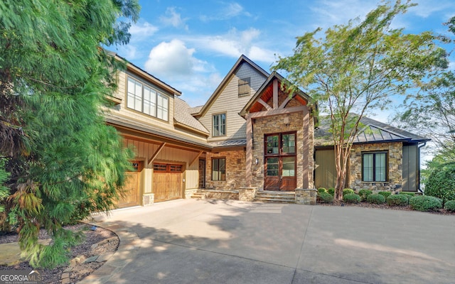 craftsman house with a garage