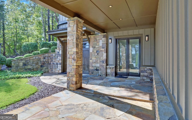 doorway to property with a patio