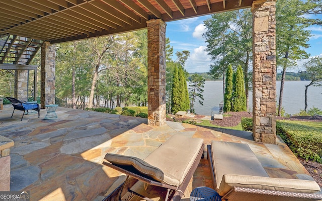 view of patio / terrace featuring a water view