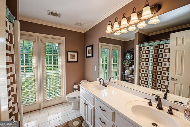 bathroom with ornamental molding, tile patterned floors, vanity, and toilet