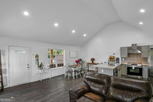 living room with sink, wine cooler, vaulted ceiling, and dark hardwood / wood-style floors