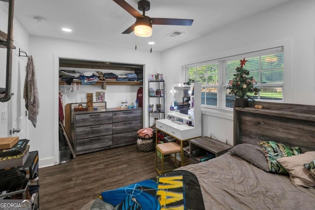 bedroom featuring dark hardwood / wood-style flooring and ceiling fan