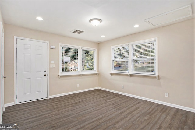 empty room featuring dark hardwood / wood-style floors